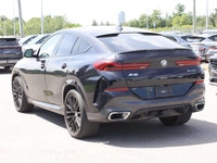 Experience distinctive styling, premium luxury, and impressive performance with this 2021 BMW X6 xDr... (image 5)