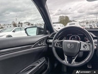 Equipped with advanced safety and intuitive connectivity, this remarkable 2021 Honda Civic Hatchback... (image 8)