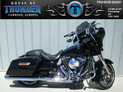 Take command of the road with this 2014 Street Glide Special Harleys best-selling touring bagger tha...