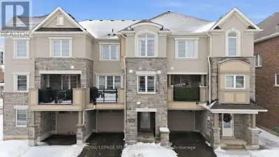 A MUST SEE - Executive, Model-Home-Like 3-Storey Townhome! Experience elevated living in this beauti...