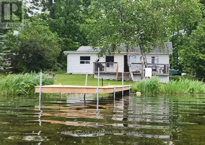 In real estate it's all about location-location-location! This jewel of a cottage offers you that an...