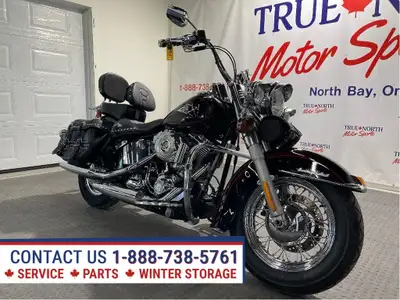 Beautiful Root Beer Pearl Canadian Harley at True North Motor Sports has just 44,174 km. Powered by...