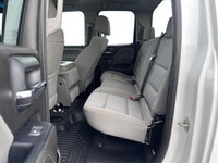 The 2019 GMC Sierra 1500 Limited 4WD Double Cab Standard Box in a striking white color is a robust t... (image 9)