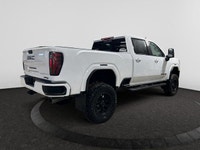 Welcome to Capital GMC! *This 2026 GMC Sierra AT4 2500HD Capital Custom Lifted Truck in Summit White... (image 4)