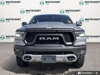 Experience the power and capability of the rugged 2020 Ram 1500 Rebel 4x4 Crew Cab 5'7 Box, availabl... (image 1)