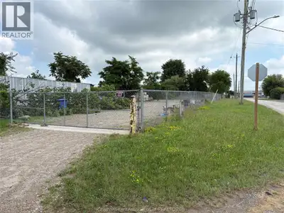 INDUSTRIAL LOT AVAILABLE 0.415 OF AN ACRE 60 FT X 300 FT FULLY FENCED YARD READY FOR YOUR USE WITH G...