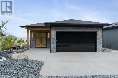 No GST! Newer Luxury Home offering stunning views of snow capped coastal mountains over the Strait o...
