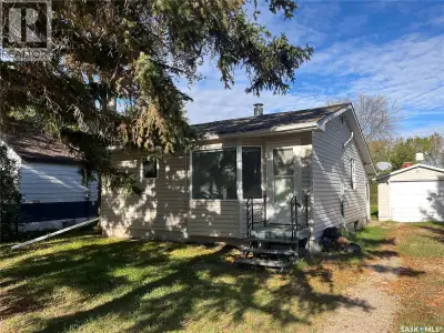 This two bedroom bungalow has a nice private back yard, open concept main area, and a 1+ car garage...