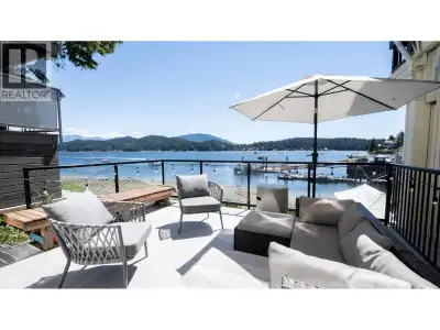 Situated in the heart of picturesque Gibsons Landing, this rare waterfront property offers a unique...