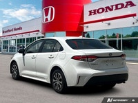 Drive further and smarter with this exceptional 2025 Toyota Corolla Hybrid LE, now available with ju... (image 4)