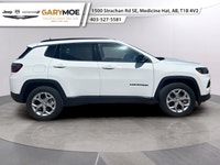 The 2024 Jeep Compass North 4x4 in stunning White offers exceptional handling and capability with it... (image 1)