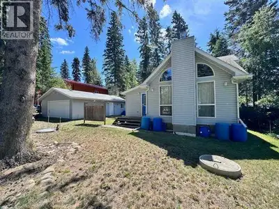 Brightsand Lake Home located at Sand Place in Evergreen is home features a double insulated garage 2...