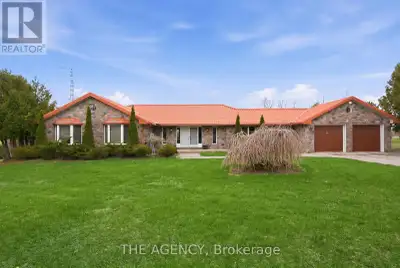Set on 25.56 acres in the sought-after community of Hampton, this exceptional property offers a rare...