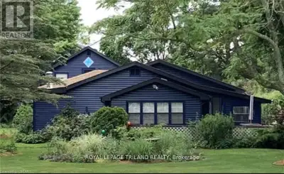 UNREAL VALUE! TWO HOUSES FOR THE PRICE OF ONE! Beautiful year-round home with lake views, across fro...