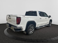 Welcome to Capital GMC! This 2026 GMC Sierra 1500 in Summit White is equipped with 4WD and Gas V8 5.... (image 4)