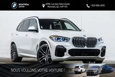 *English below* *Français:* Ce BMW X5 xDrive50i, affichant 61463 km, provient d'un seul propriétaire...