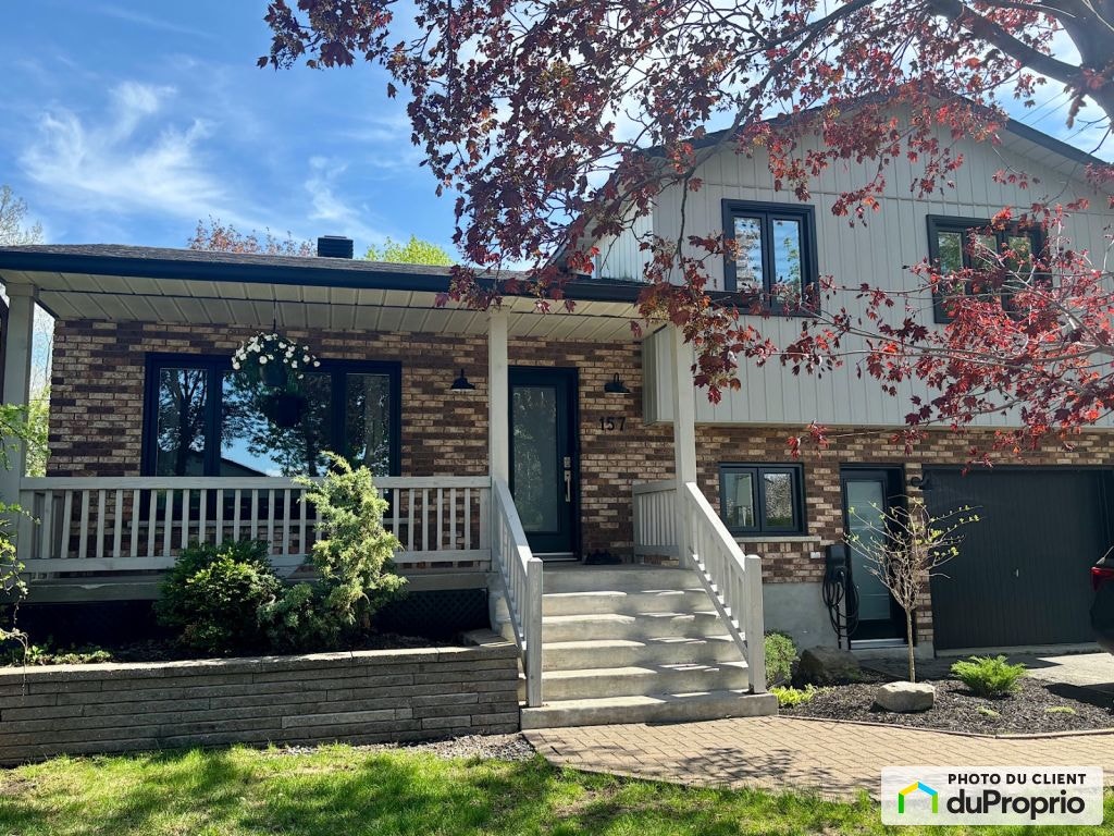 $841,000 - Split Level for sale in Ste-Rose — photo 1