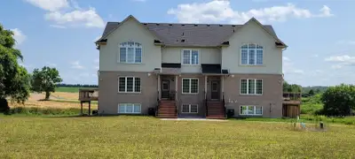 Custom built new multi-unit house sitting on 22 acres of land in the city of Kitchener, close to new...