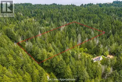 Beautiful 5 acre bare land parcel on Hornby Island offering sunny, flat acreage with mature trees th...