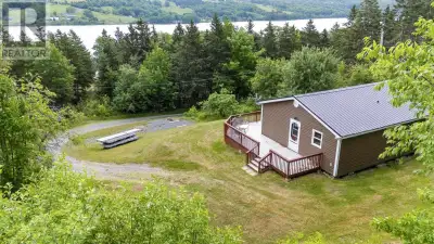 Escape to this adorable 2-bedroom cottage in the highly sought-after Locharber communityjust steps f...