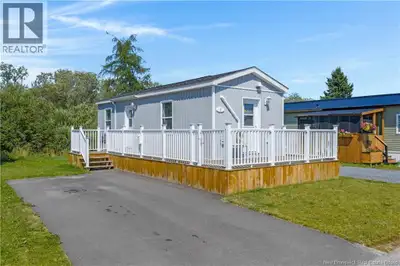 Absolutely lovely, almost brand-new mini home offering everything you need to enjoy comfortable home...