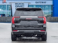 The 2026 GMC Yukon Elevation commands attention with a commanding full-size silhouette that perfectl... (image 6)