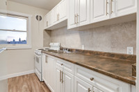 Amenities: Heat & Water Included • Spacious Rooms • Affordable Parking Suite & Building: Bachelor, a... (image 4)