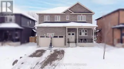 Over 2,700 sq. ft. of refined living space with a separate side entrance to the basement and a premi...