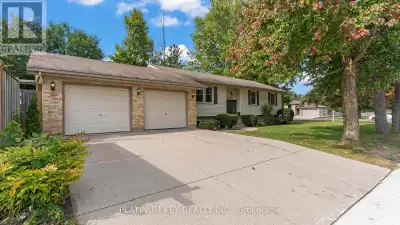 A beautifully maintained raised bungalow on a generous corner lot (0.24 acres) with a 2-car garage....