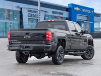 The 2017 Chevrolet Silverado 2500HD LT commands attention with a rugged, purposeful silhouette that... (image 4)