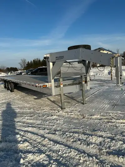Heavy-duty 40" gooseneck trailer with all-aluminum construction, designed for maximum hauling capaci...