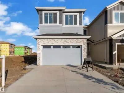 **SPICE KITCHEN, OPEN TO BELOW, SPA LIKE ENSUIT**Welcome to this exquisite two story home in Beaumon...