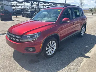 Welcome to Country Hills Volkswagen 2014 Volkswagen Tiguan Comfortline Red Metallic 4Motion Our team...