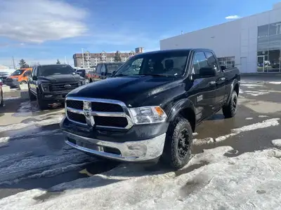 Calling all enthusiasts for this stunning and agile 2014 Ram 1500 ST. Take pleasure in the quick shi...