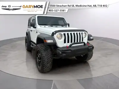 The 2021 Jeep Wrangler Sport S 4x4 in White with its rugged 44 drivetrain is built to handle any ter...