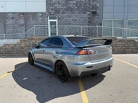 This 2014 Mitsubishi Lancer Evolution delivers pure performance with its turbocharged 2.0L engine, a... (image 9)