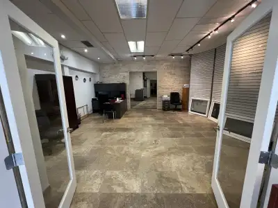 Unit 102 at 942 Erin Street is now available for lease, offering a versatile office/industrial space...