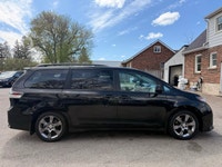 Looking for a reliable and spacious family vehicle? Check out this sleek black 2011 Toyota Sienna SE... (image 7)