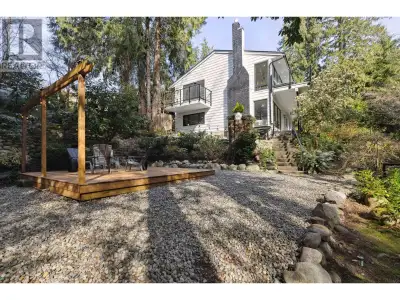 Nestled in a tranquil creekside setting in Ambleside, this beautifully renovated 5-bedroom, 2.5-bath...