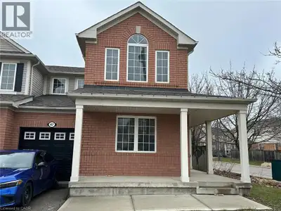 Beautiful end-unit townhome featuring a large fenced yard—perfect for families and outdoor living. T...