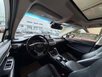 The NX 200t is characterized by its aggressive "spindle" grille and sharp, angular body lines. As th... (image 6)