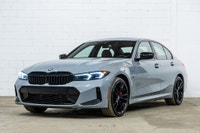 *English below* *Français:* Cette spectaculaire BMW 330e xDrive 2023 affichant 48 882 km, provenant... (image 2)