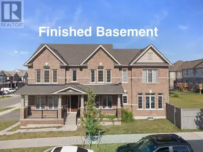 This executive home sits on an expansive corner lot. Stunning 2-year-old home offers almost 3500 sqf...