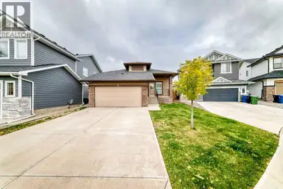 Welcome to this rare, exceptional 6-bedroom, 4-bathroom bungalow in the desirable community of Evans...