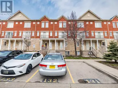 Renovated with new flooring, pot lights, kitchen counter top, freshly painted town house with beauti...