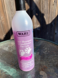 cat scratch post - new - Bottle of cat shampoo