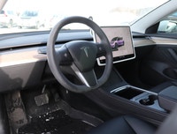 Experience the epitome of modern driving with the 2023 Tesla Model 3 Long Range AWD in a stunning Wh... (image 6)