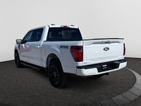 Check out this vehicle's pictures, features, options and specs, and let us know if you have any ques... (image 2)