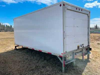 Nice used insulated van body to make your storage shed from. It is 18 ft x 8.5 ft. Rear door opening...