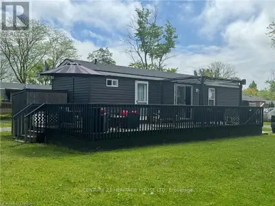 Welcome to the perfect seasonal home in Niagara-on-the-Lake. Surrounded by vineyards, it offers a tr...